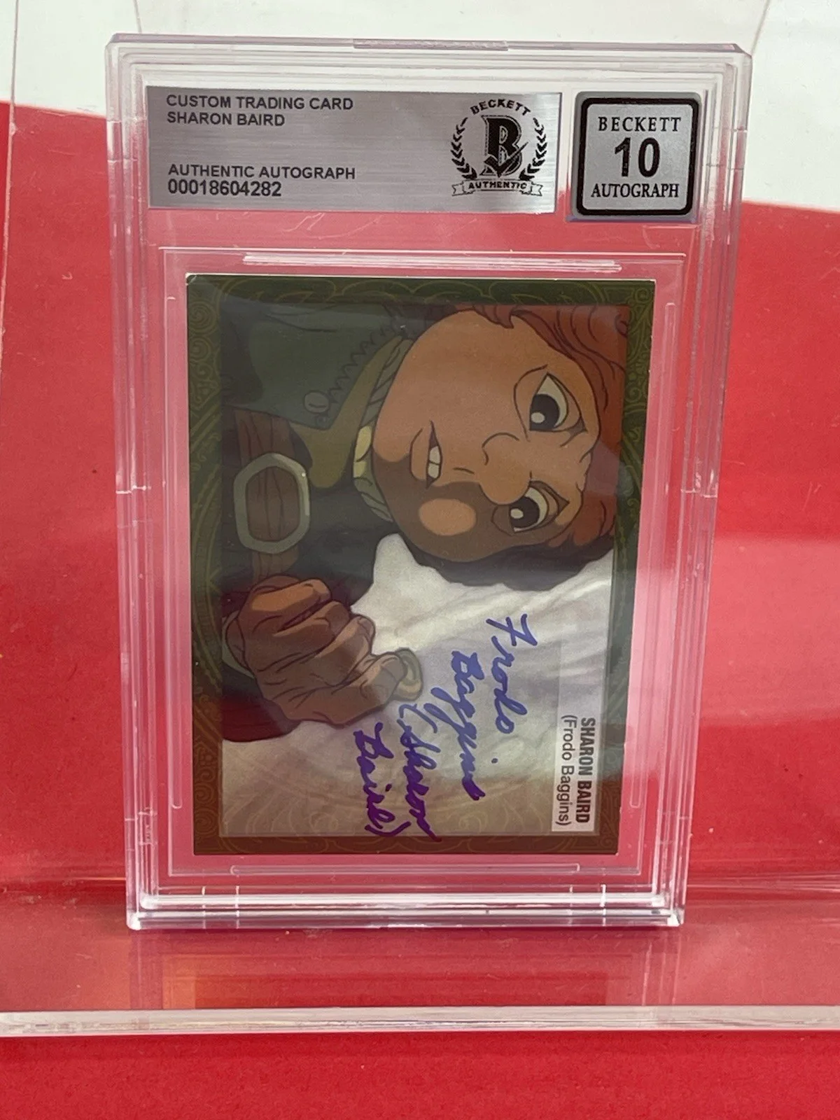 Sharon Baird — Sharon Baird Frodo Baggins signed 1979 The Hobbit Card Beckett Slabbed grade 10