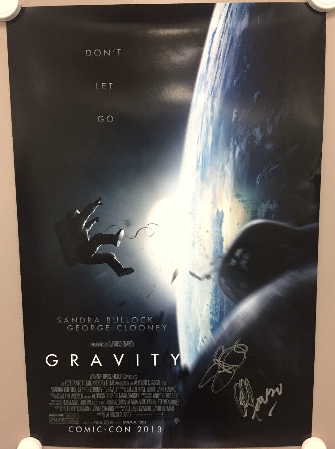 Sandra Bullock, Alfonso Cuaron — signed Sandra Bullock Gravity comic con SDCC poster w Alfonso Cuaron autograph, image 3
