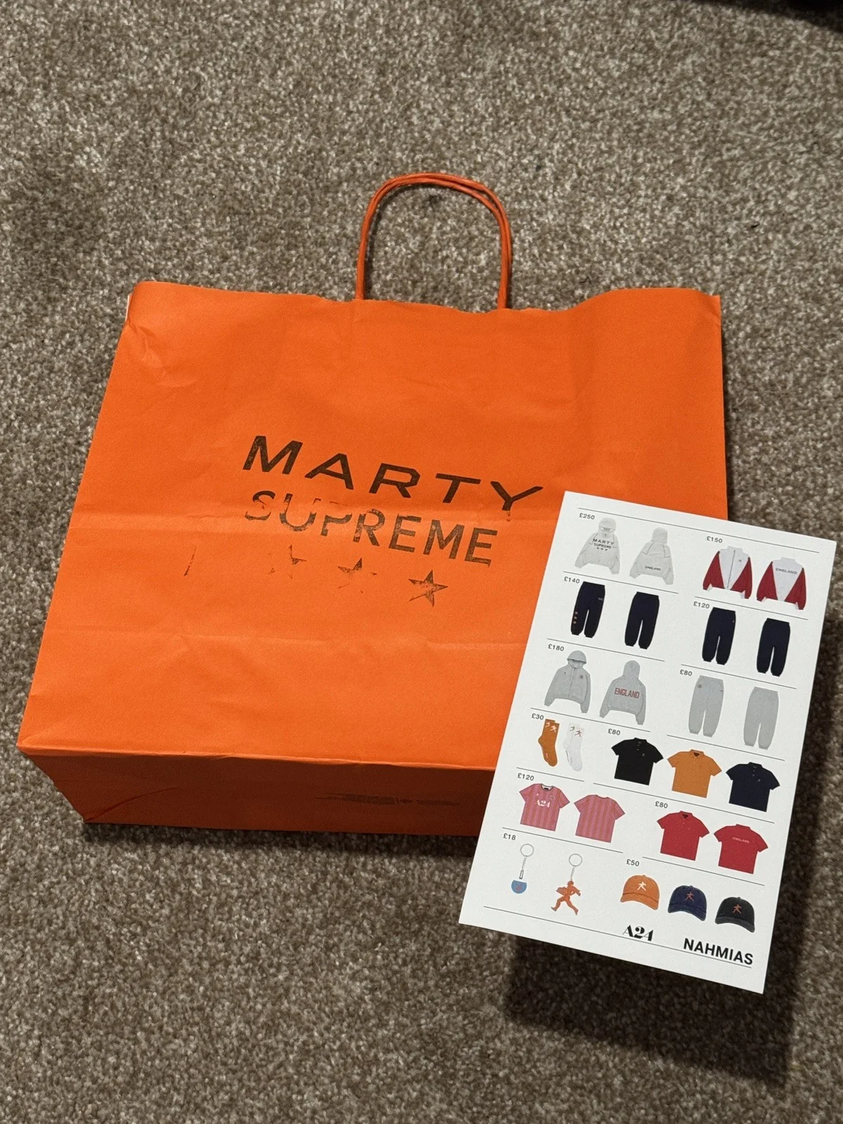 Marty Supreme London Pop Up Orange Bag And Apparel Menu Card By A24 Nahmias, изображение 3
