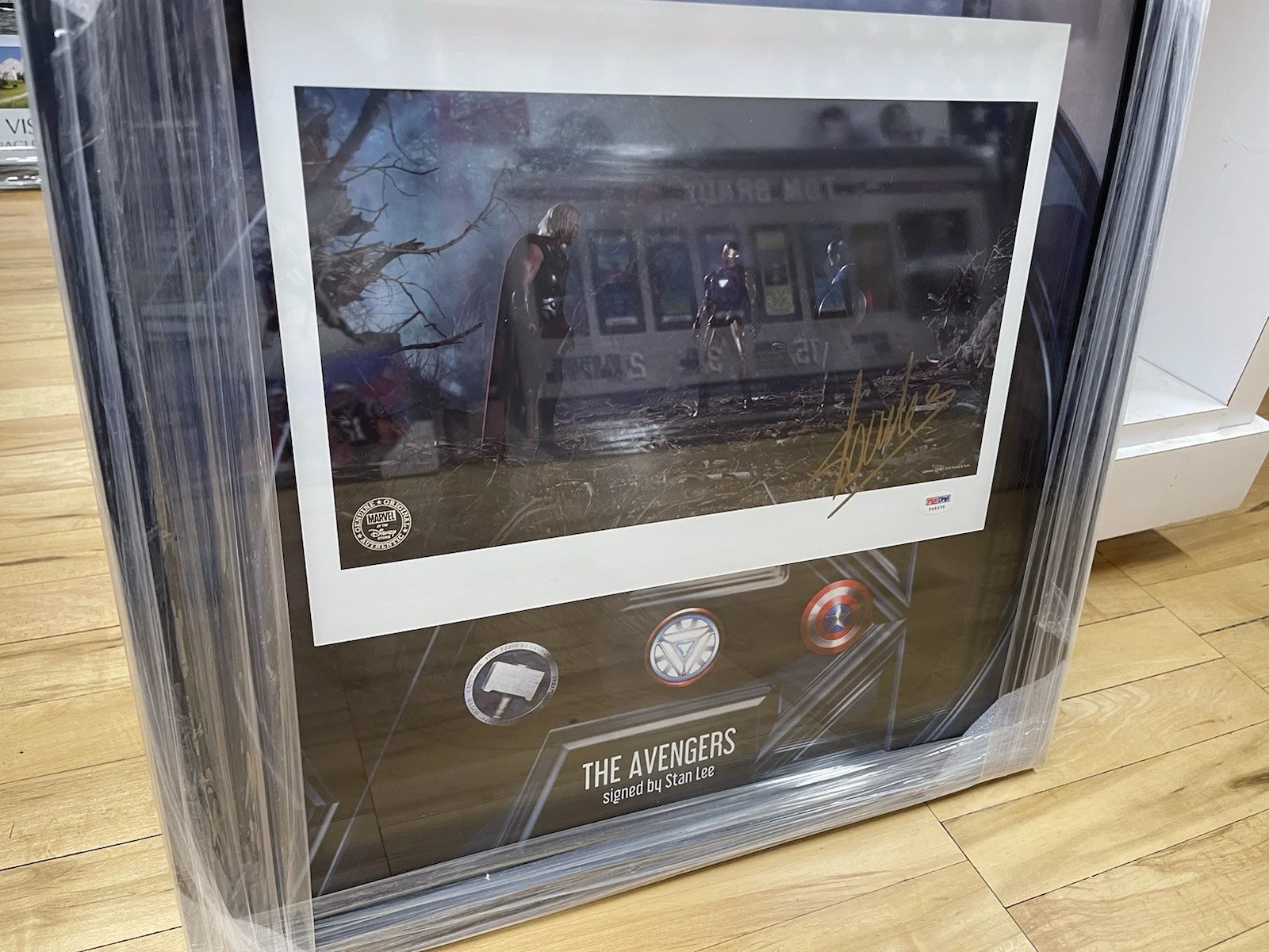 Stan Lee — Stan Lee Avengers Autographed 14x10 Movie Photo Thor Iron Man Cpt America PSA
