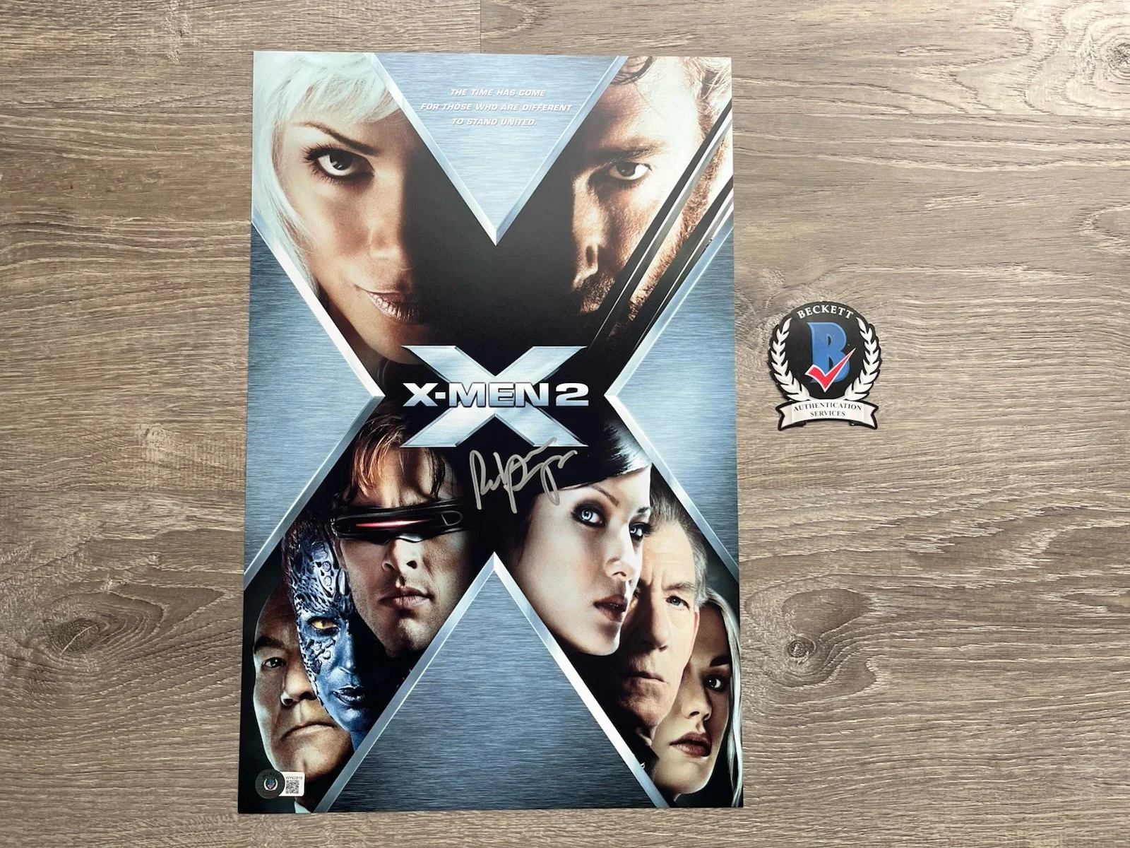 Rebecca Romijn — Rebecca Romijn Signed X2 11x17 Photo Beckett COA X-Men Mystique Autograph Marvel
