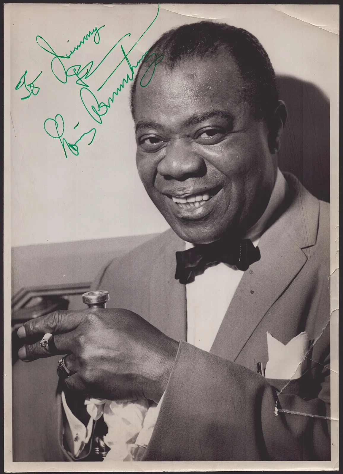 Louis Armstrong — LOUIS "SATCHMO" ARMSTRONG - AUTOGRAPHED INSCRIBED PHOTOGRAPH CIRCA 1963