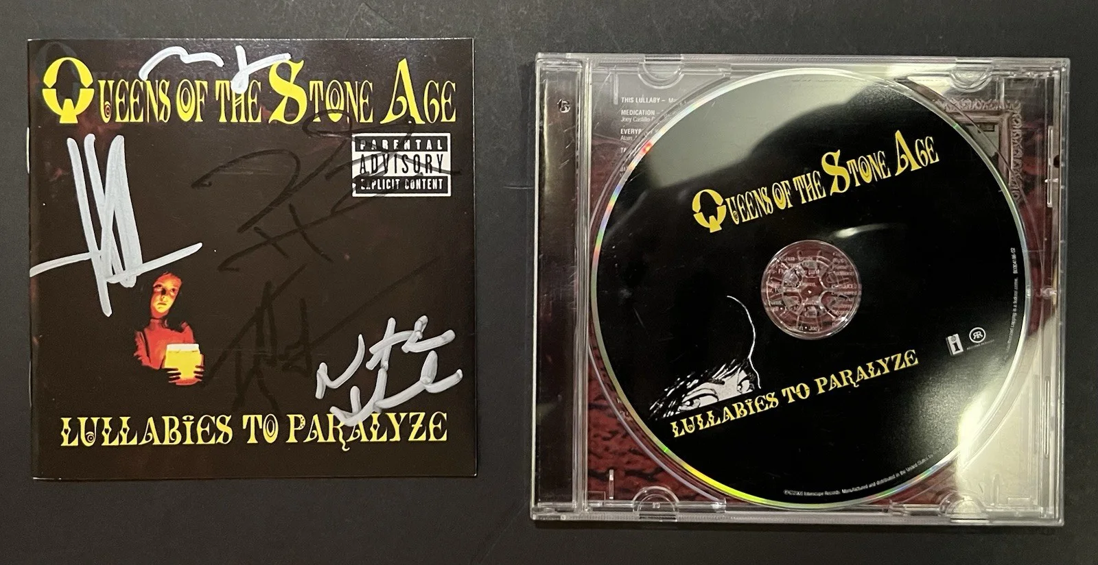 AUTHENTIC Autographed Queens of the Stone Age Lullabies CD insert hand signed, image 2