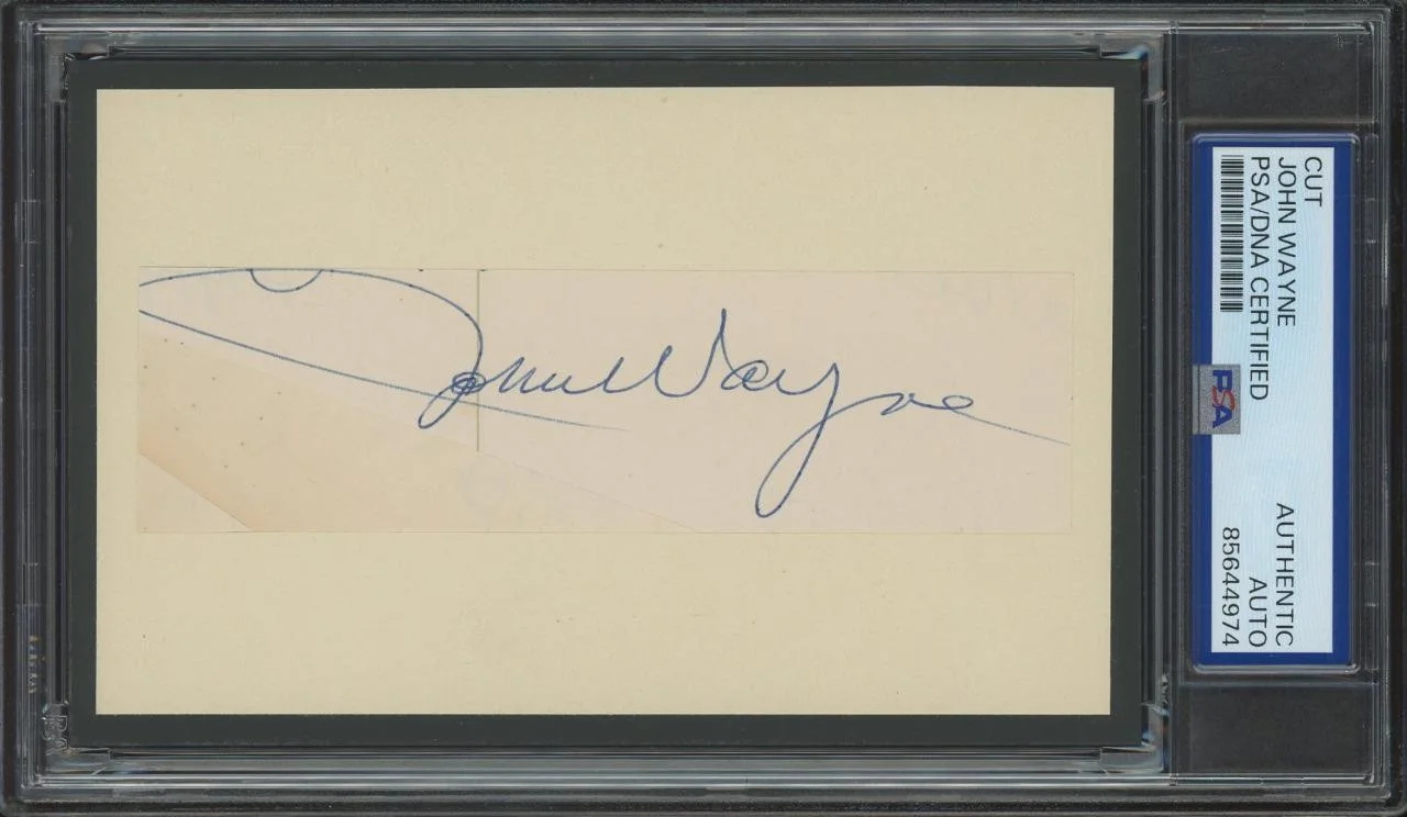 John Wayne — JOHN WAYNE (1907-1979) autograph cut | "Hondo" & "Rio Bravo" - signed PSA/DNA
