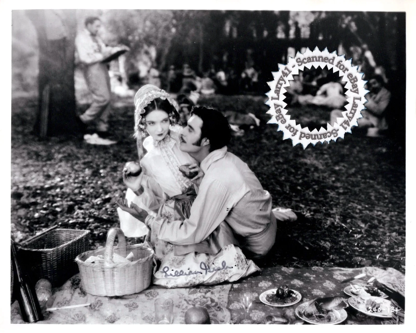 Lillian Gish — AUTOGRAPHED Lillian Gish SIGNED still LA BOHEME (1926) John Gilbert, picnic hug!