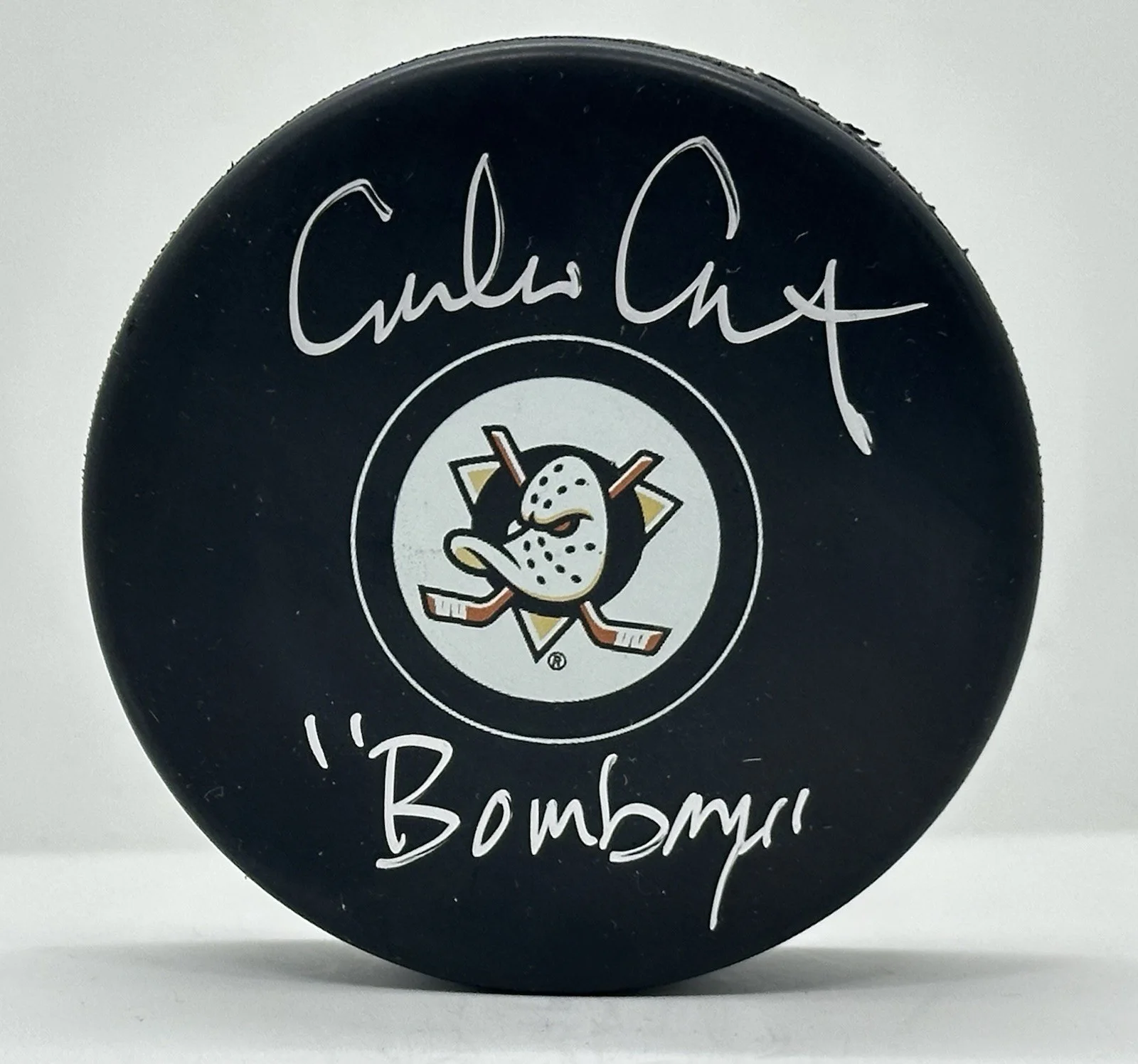 Emilio Estevez — Emilio Estevez Autographed The Mighty Ducks Hockey Puck Bombay ! BAS W