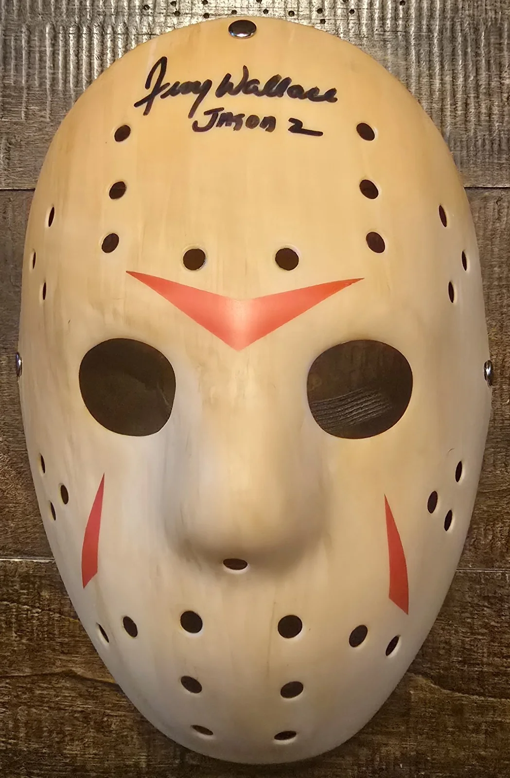 Jerry Wallace — Jerry Wallace signed Jason Friday the 13th Mask with Jason 2 inscription. Comes