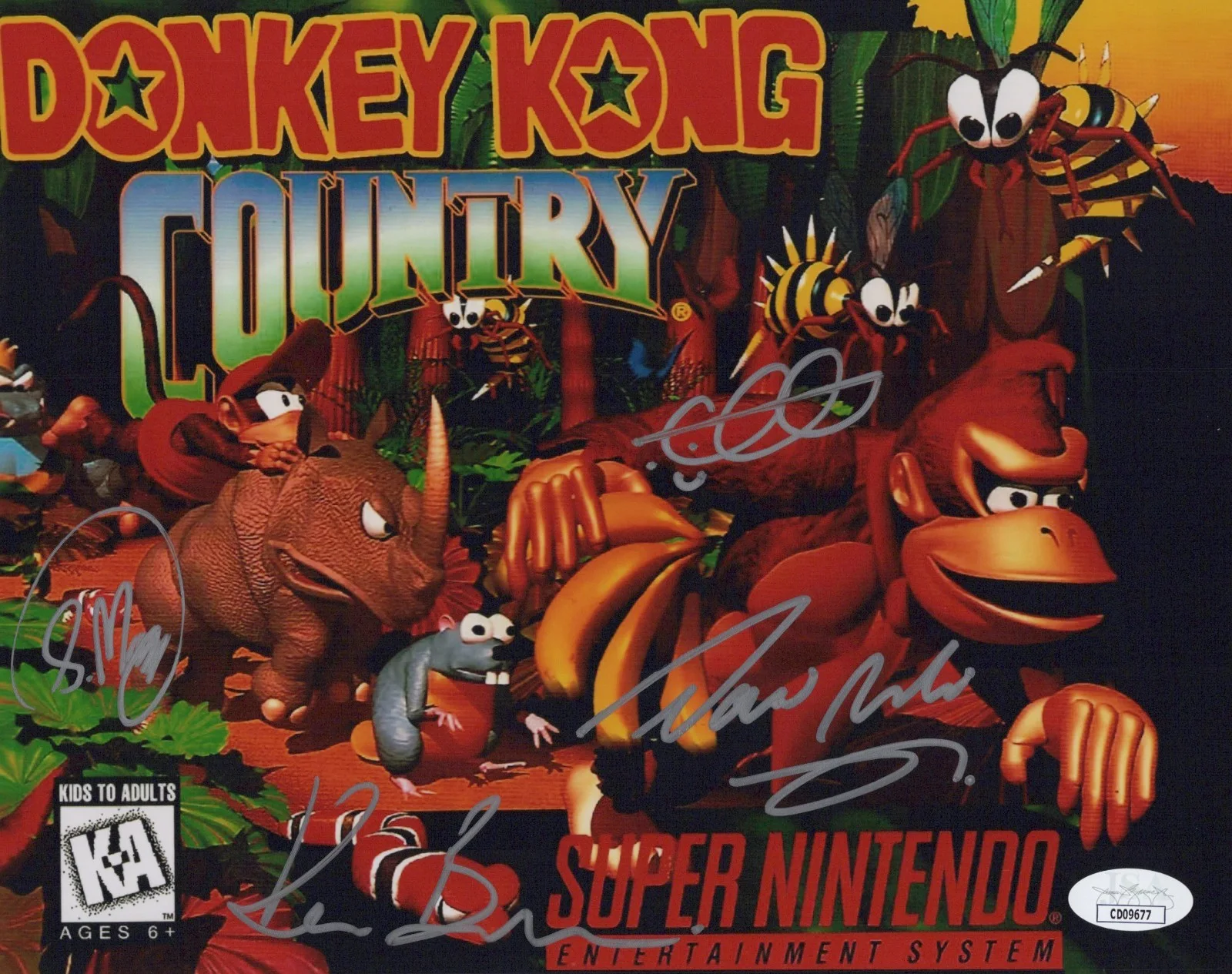 David Wise, Kevin Bayliss, Chris Sutherland & Steve Mayles — Chris Sutherland David Wise +2 Signed 8x10 Donkey Kong Country Photo JSA COA
