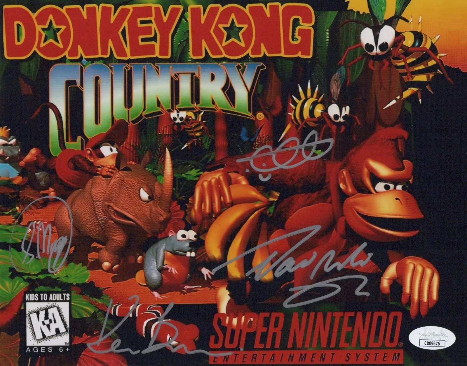 David Wise, Kevin Bayliss, Chris Sutherland & Steve Mayles — Chris Sutherland David Wise +2 Signed 8x10 Donkey Kong Country Photo JSA COA