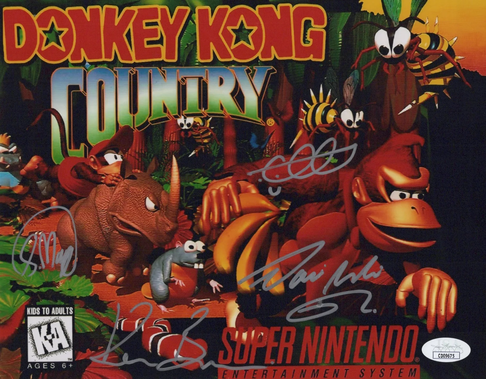 David Wise, Kevin Bayliss, Chris Sutherland & Steve Mayles — Chris Sutherland David Wise +2 Signed 8x10 Donkey Kong Country Photo JSA COA