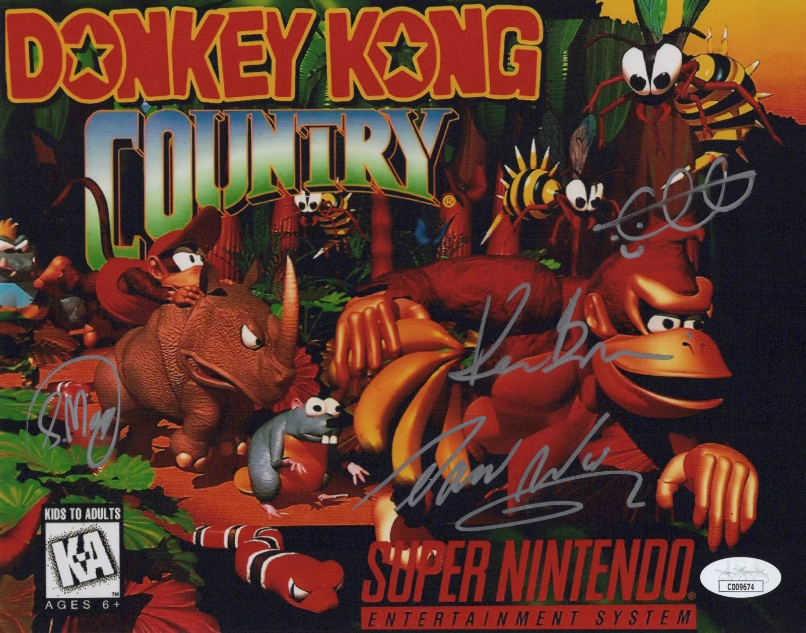 David Wise, Kevin Bayliss, Chris Sutherland & Steve Mayles — Chris Sutherland David Wise +2 Signed 8x10 Donkey Kong Country Photo JSA COA