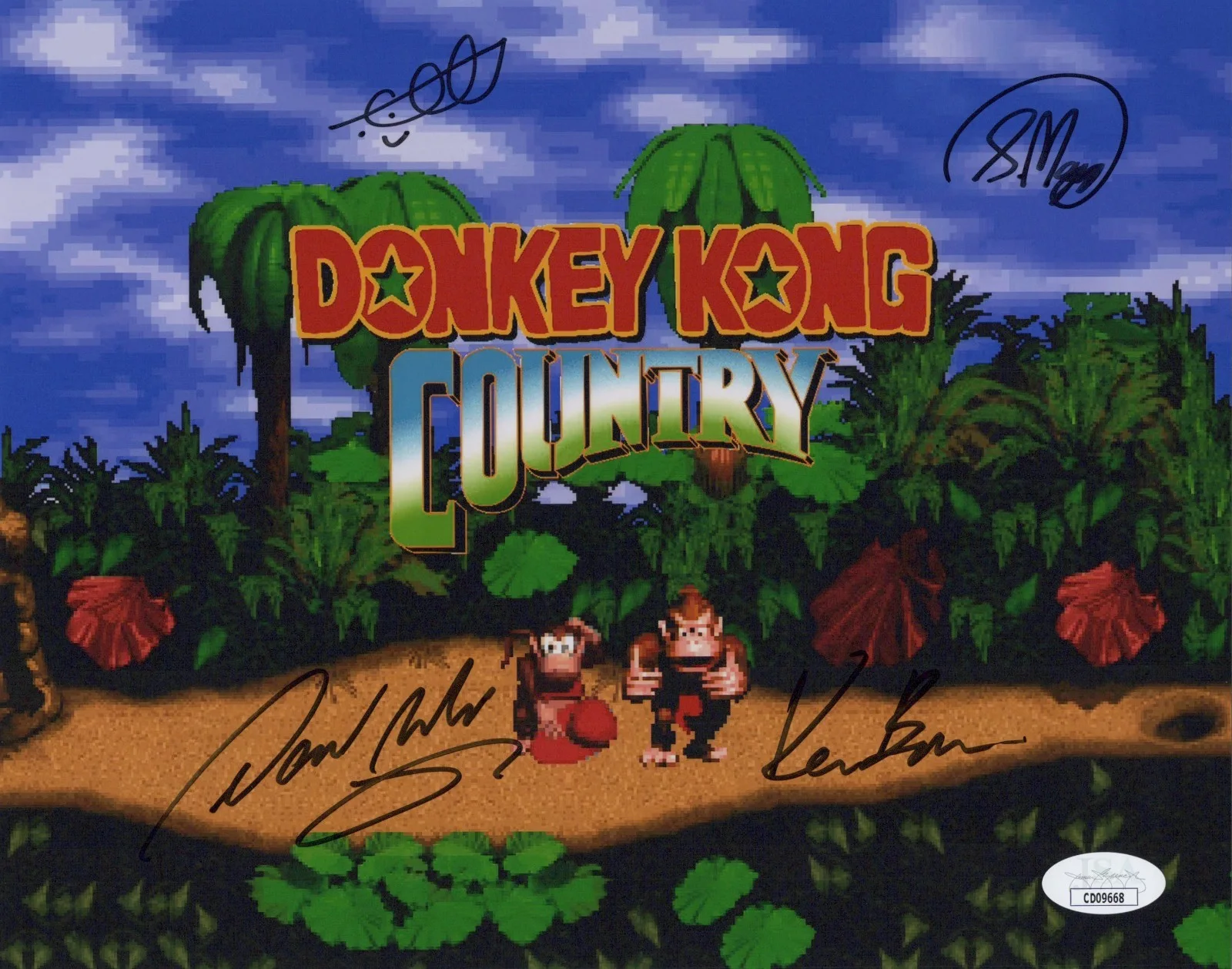 David Wise, Kevin Bayliss, Chris Sutherland & Steve Mayles — Chris Sutherland David Wise +2 Signed 8x10 Donkey Kong Country Photo JSA COA