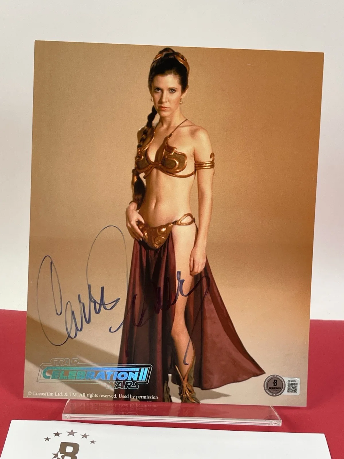 Carrie Fisher — Carrie Fisher Signed Star Wars Princess Leia Celebration II 8x10 Beckett Letter, image 2