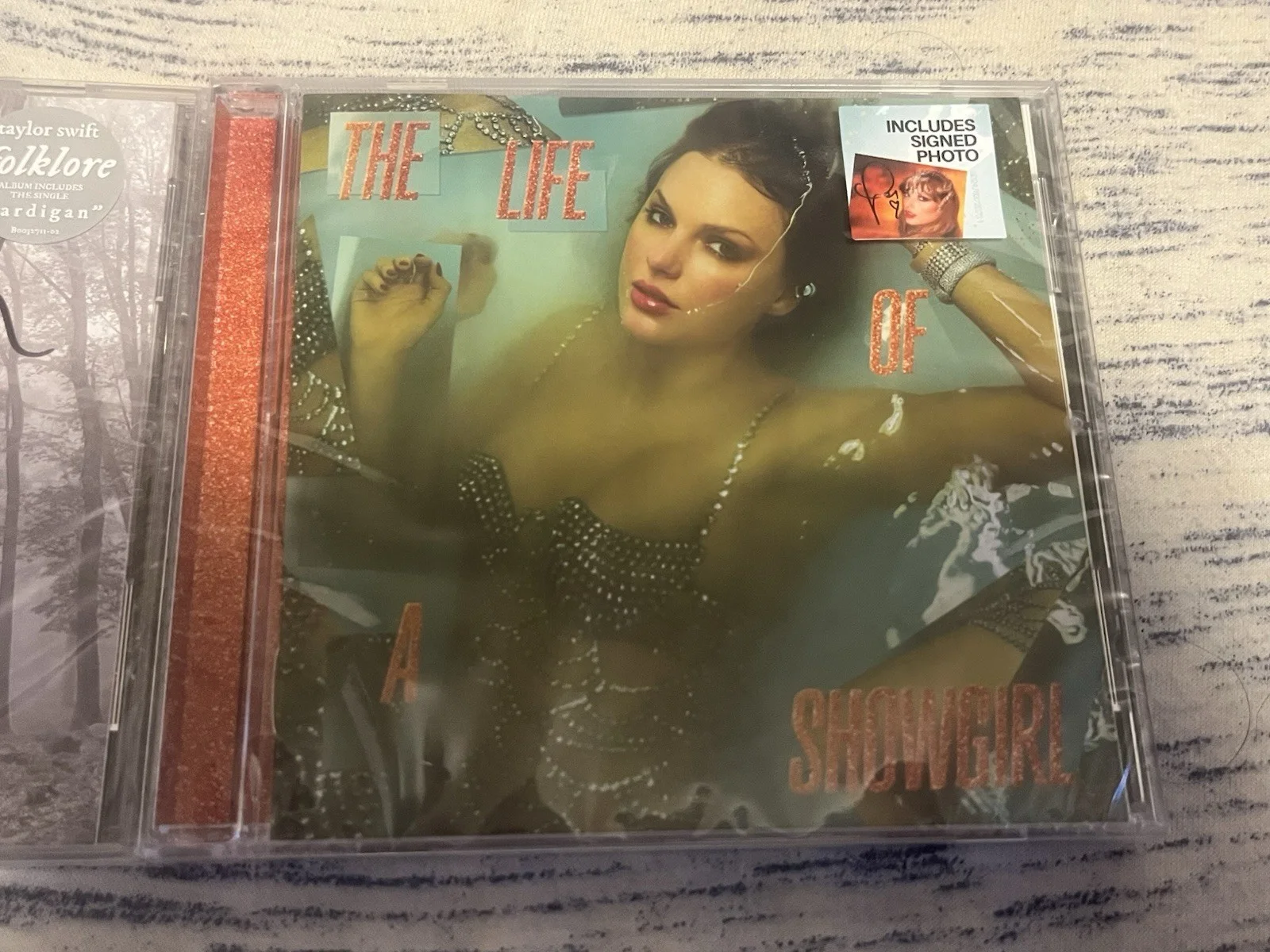 TAYLOR SWIFT SIGNED FOLKLORE CD AND SIGNED THE LIFE OF A SHOWGIRL CD, image 5