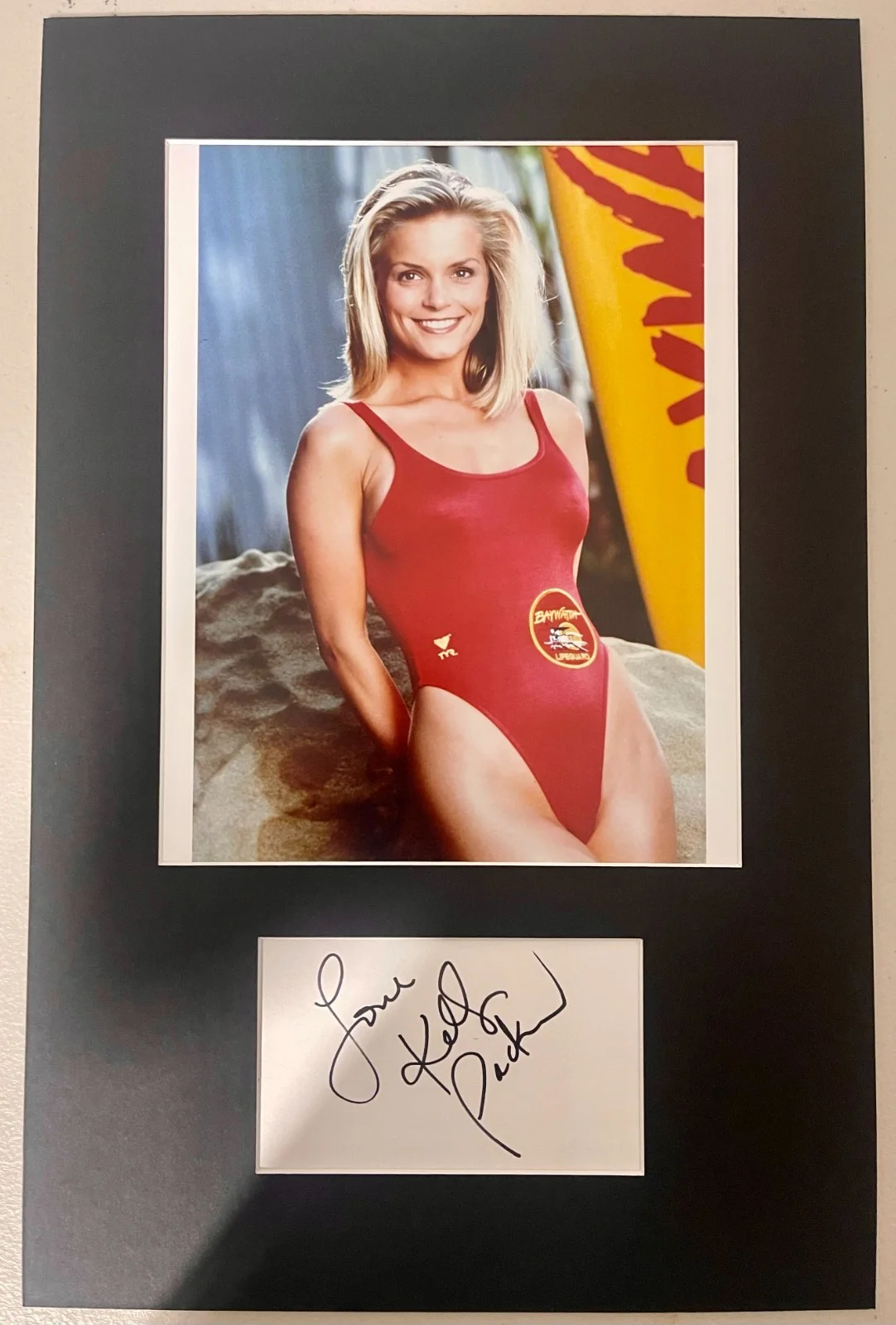 KELLY PACKARD — Kelly Packard Baywatch matted signed index card with photo 11x17 #1 April