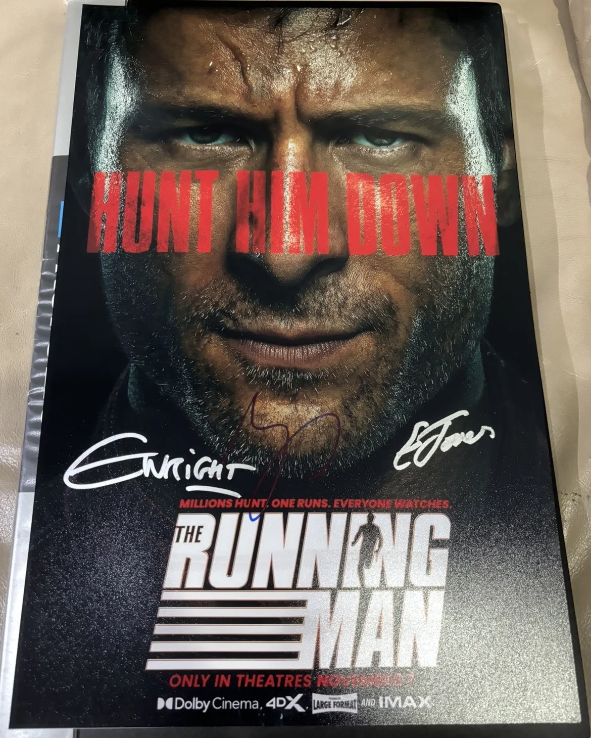Edgar Wright, Glen Powell — The Running Man 11x17 Photo Signed by Edgar Wright, Glen Powell and Emilia Jones