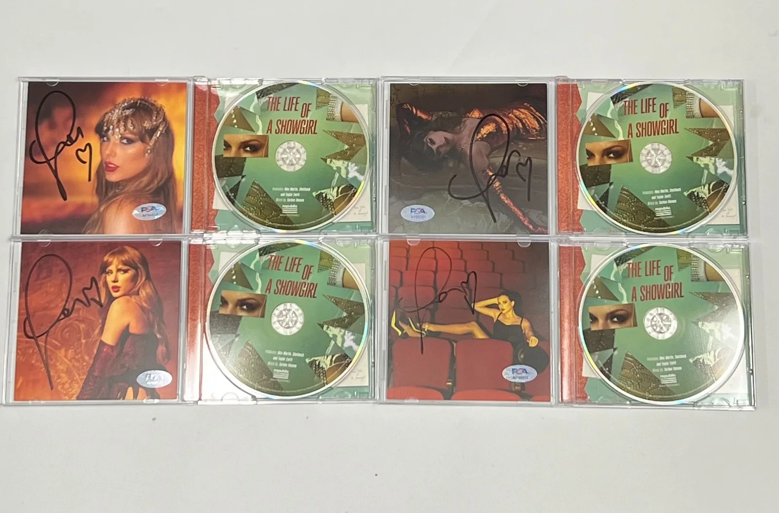 Taylor Swift — Taylor Swift Signed CD Cover Bundle PSA/DNA The Life of a Showgirl