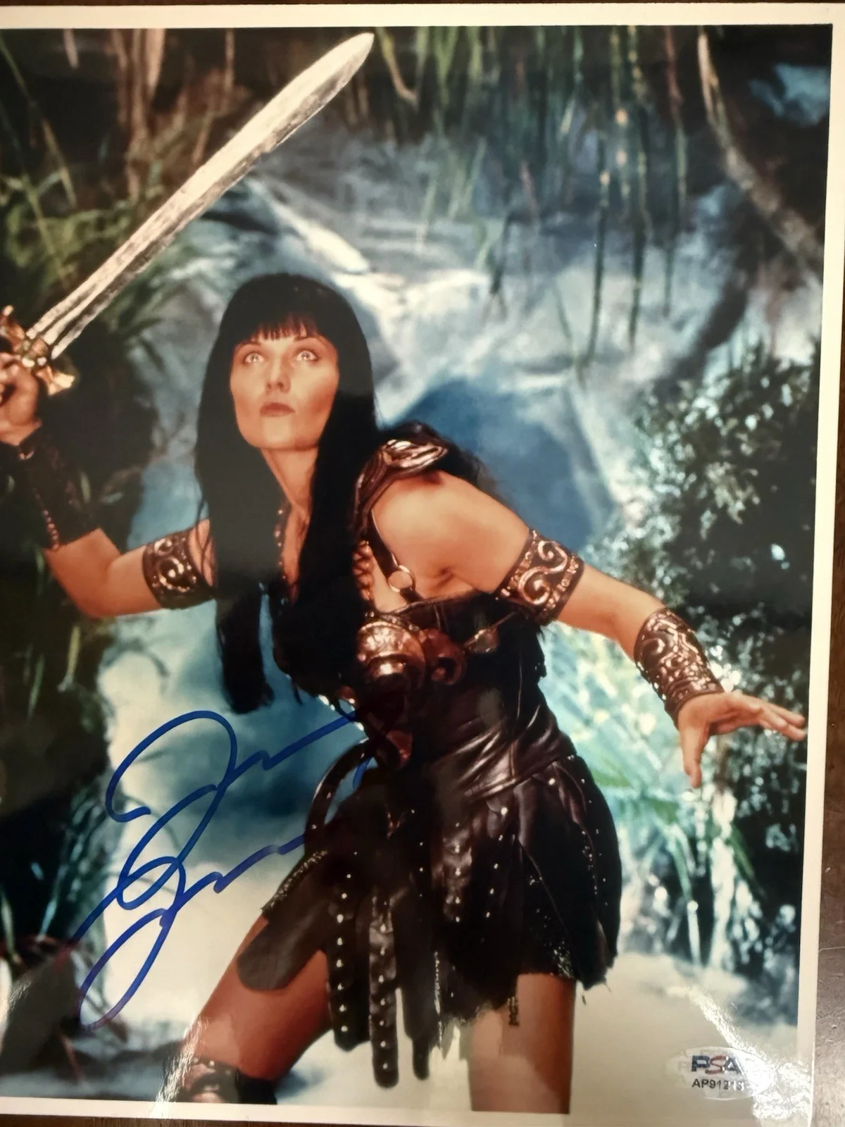 Lucy Lawless — LUCY LAWLESS HAND SIGNED IN PERSON AUTOGRAPHED XENA RARE BECKETT COA 8x10 PHOTO