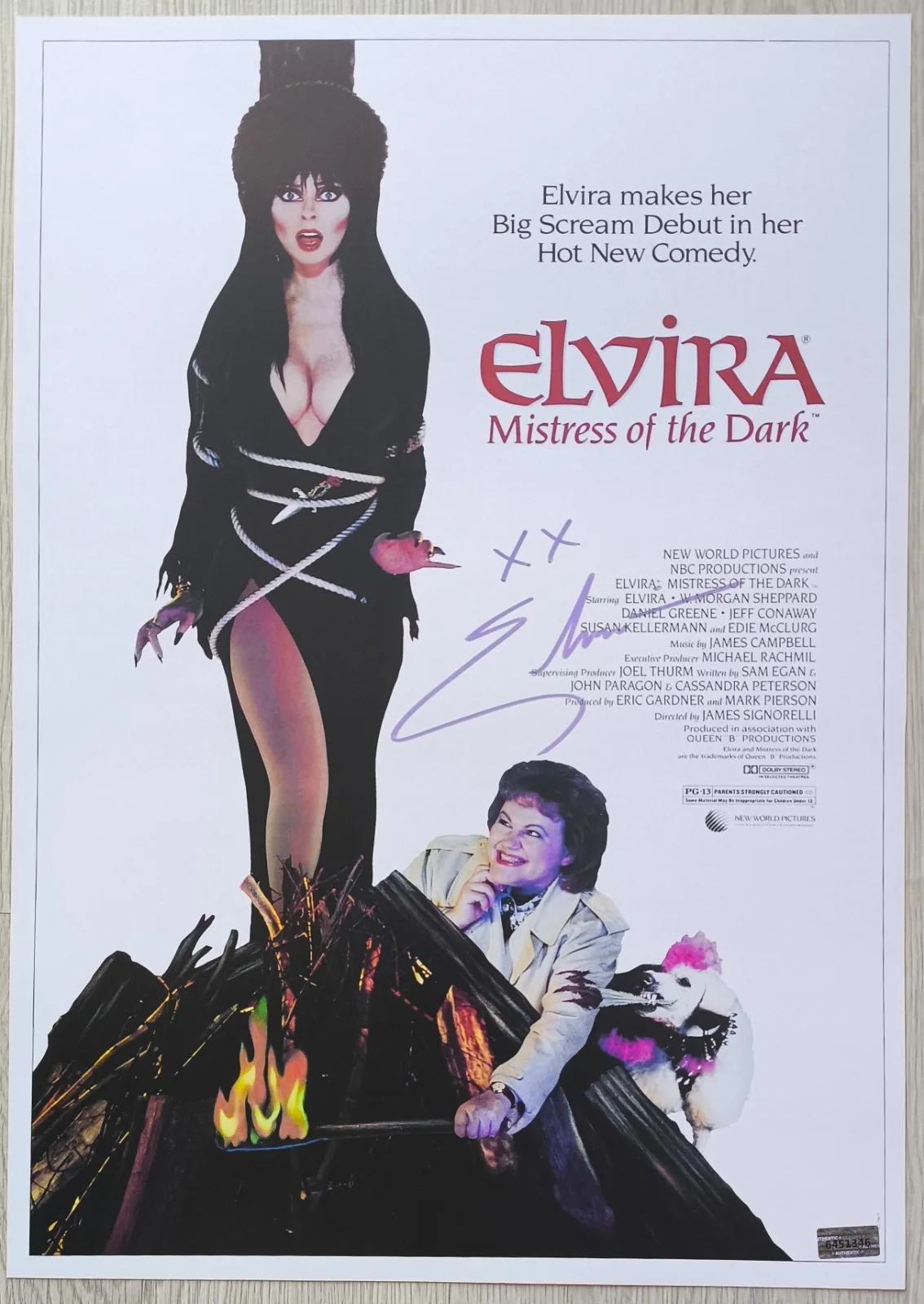 Cassandra Peterson — Autograph Cassandra Peterson Signed 11x17 Poster (Elvira, Mistress of the Dark)