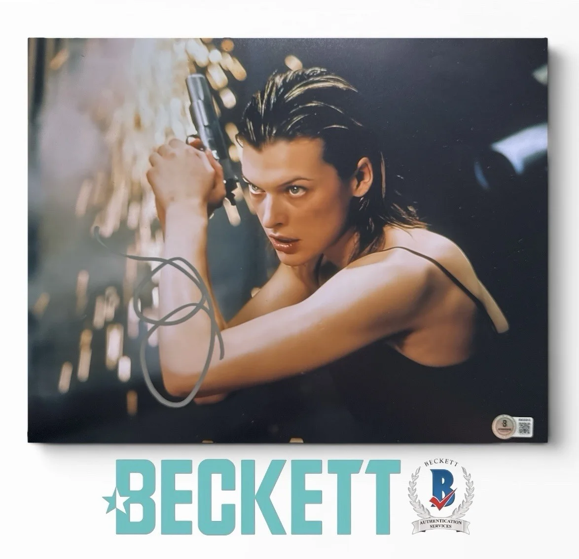 Milla Jovovich — Milla Jovovich Autograph Signed 11x14 Resident Evil Alice Photo Beckett COA