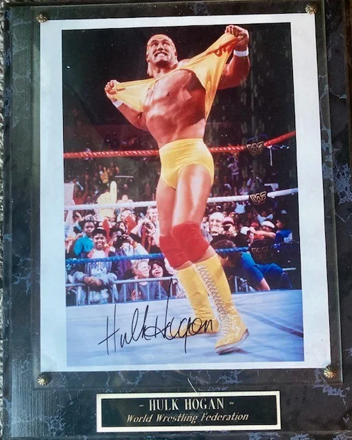 Hulk Hogan — Hulk Hogan autographed 8X10 photo w/plaque and nameplate