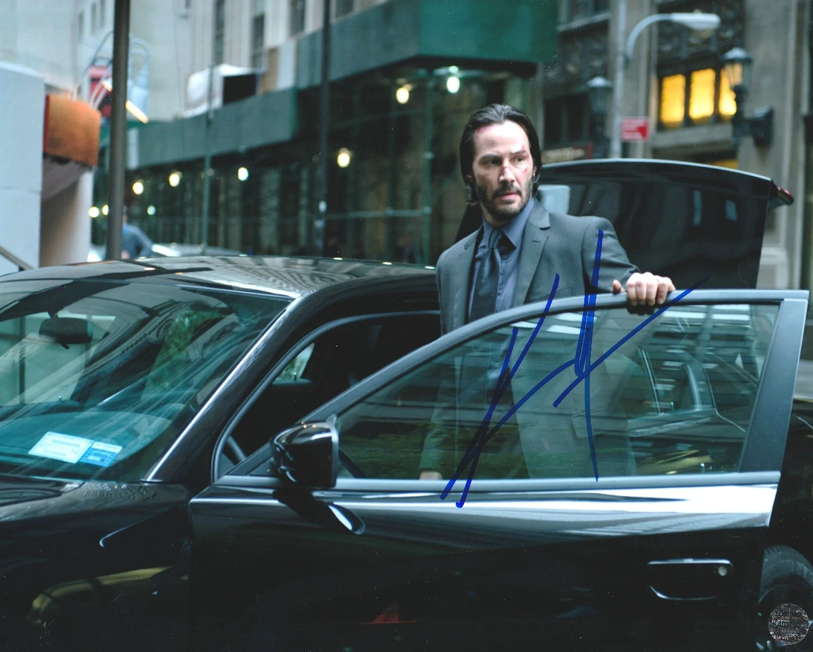 Keanu Reeves — Keanu Reeves Autographed John Wick 8x10 Photo with COA/Matching Hologram