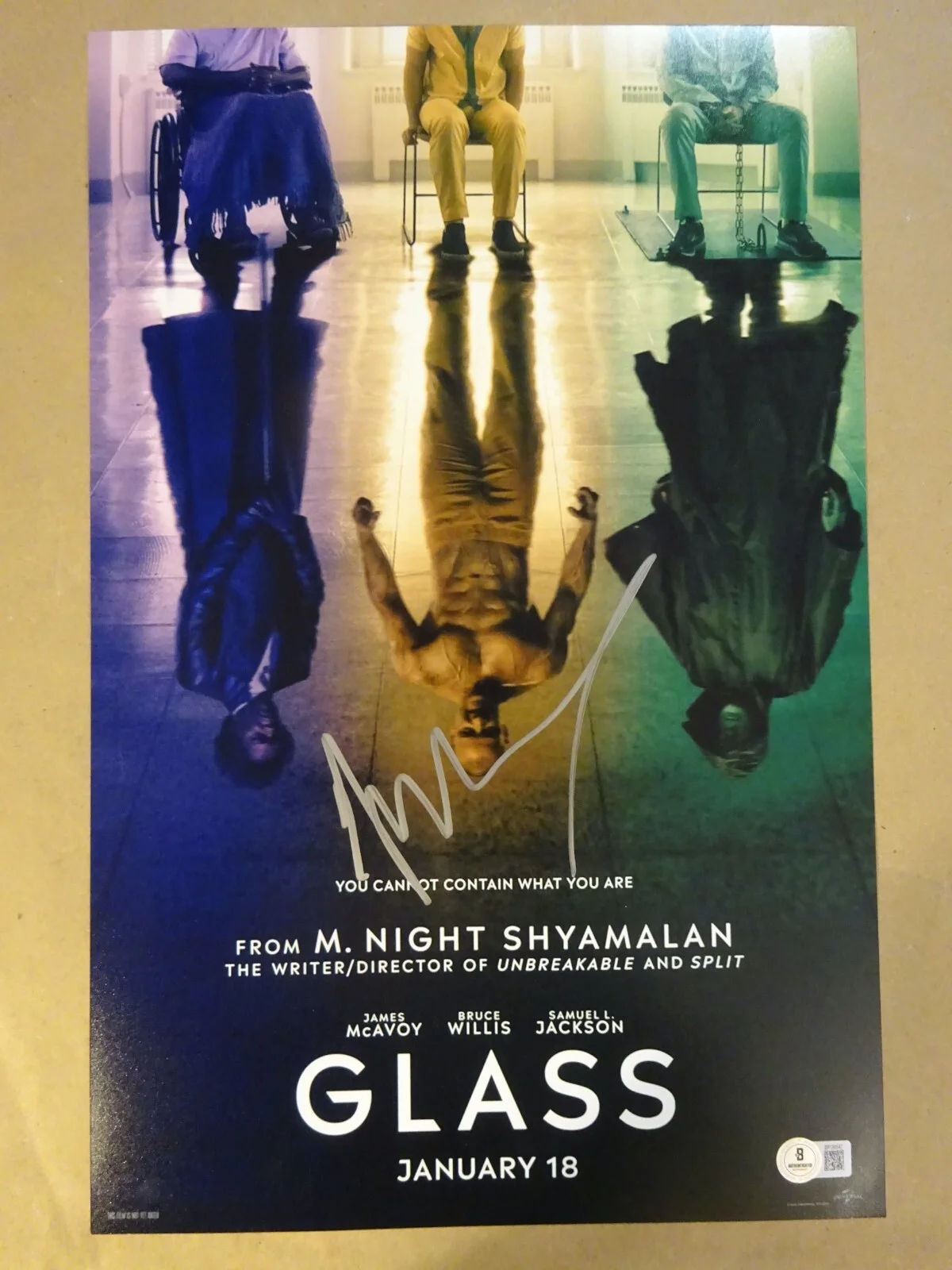 M Night Shyamalan — Signed M Night Shyamalan Autographed Glass 11"x17" Photo Beckett BAS COA