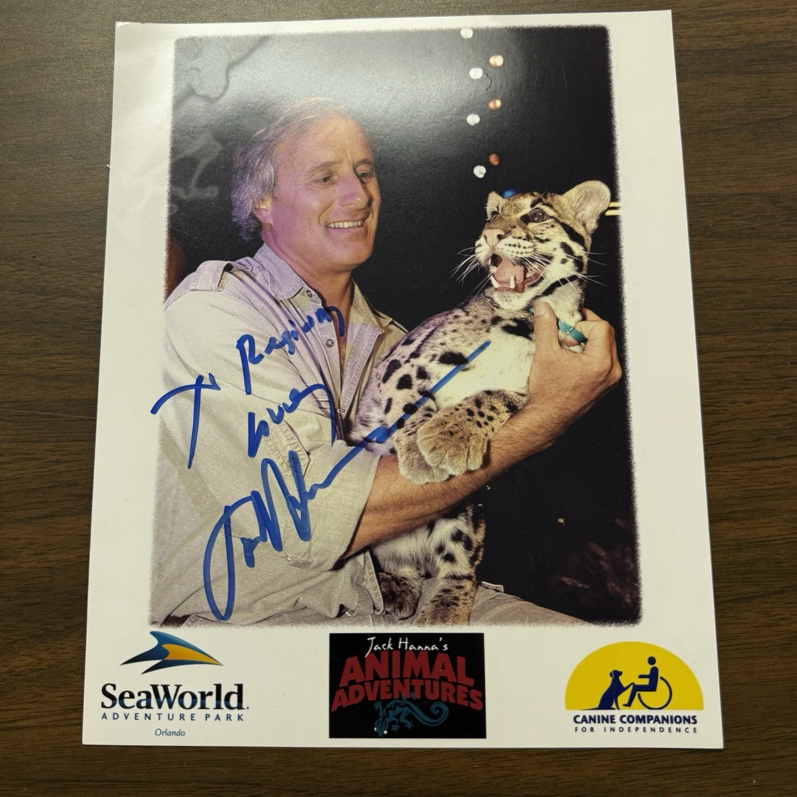Jack Hanna — Jack Hanna Signed/Autographed Photo Holding Leopard Seaworld Wildlife Protection