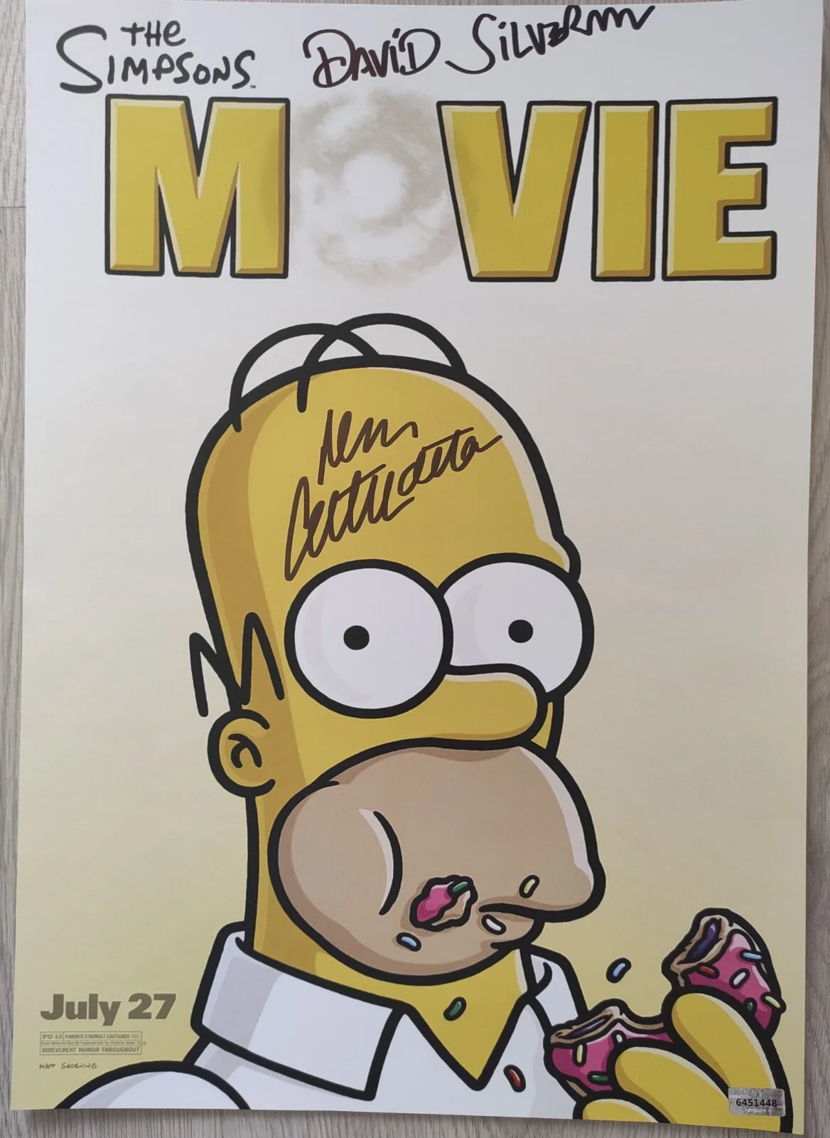 David Silverman, Dan Castellaneta — Autograph David Silverman,Dan Castellaneta Signed 11x17 Poster ( The Simpsons )