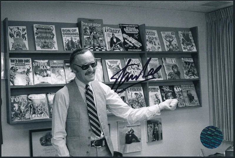 Stan Lee — Stan Lee at Marvel Office in 1980 Autographed Photo Excelsior Approved Hologram