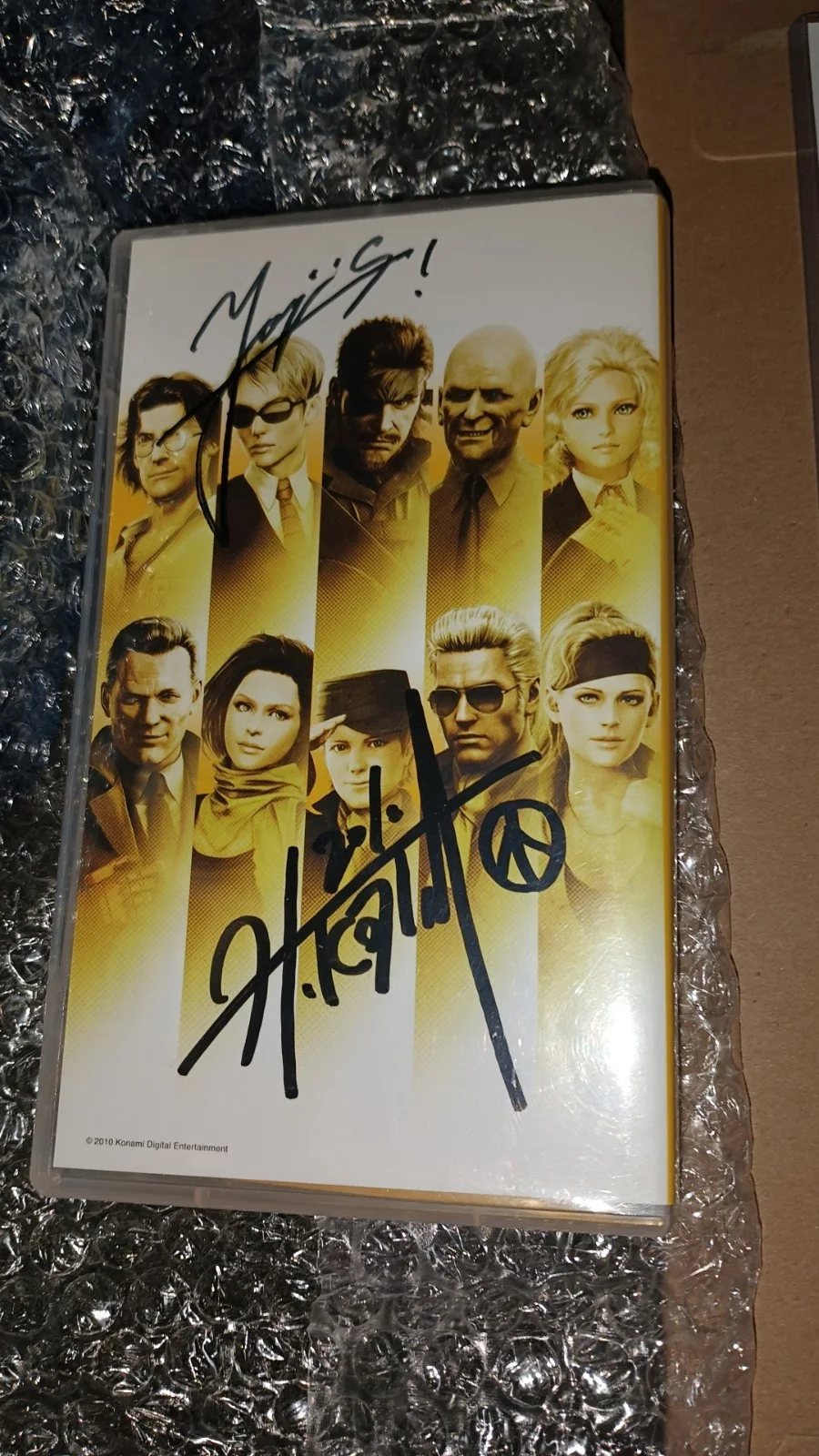 hideo kojima/yoji shinkawa — Metal Gear Solid PeaceWalker Autographed By Hideo Kojima, Yoji Shinkawa, Yumi, изображение 2