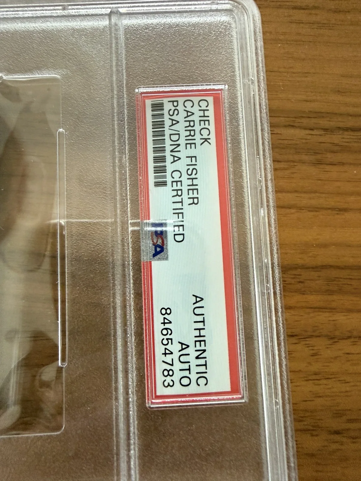 Carrie Fisher — Carrie Fisher (Leia) Signed Autograph Check Encapsulated PSA/DNA STAR WARS, image 2