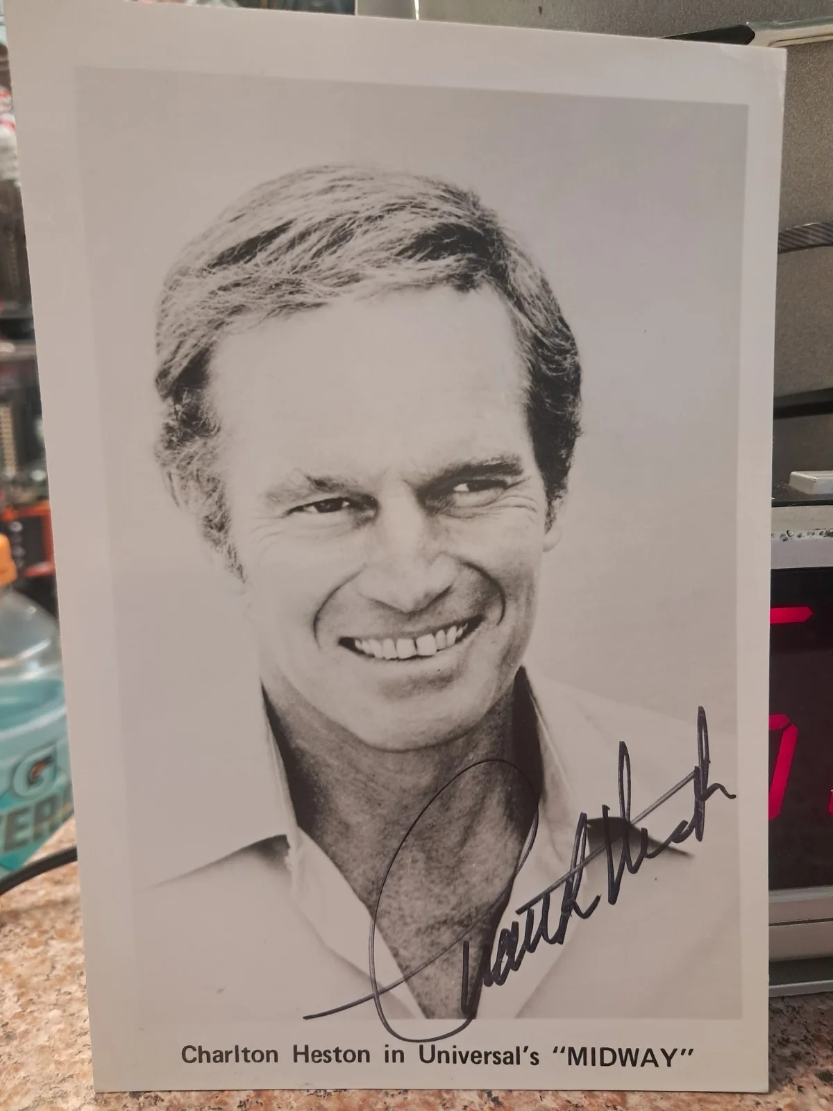 Charlton Heston — Charlton Heston autographed original photograph Midway Signed Movies