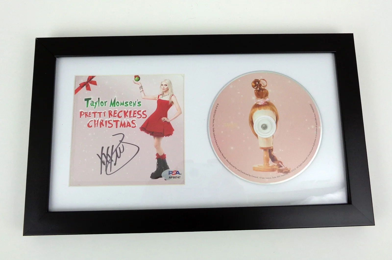Taylor Momsen — Taylor Momsen Signed The Pretty Reckless Christmas Grinch CD Framed PSA/DNA COA