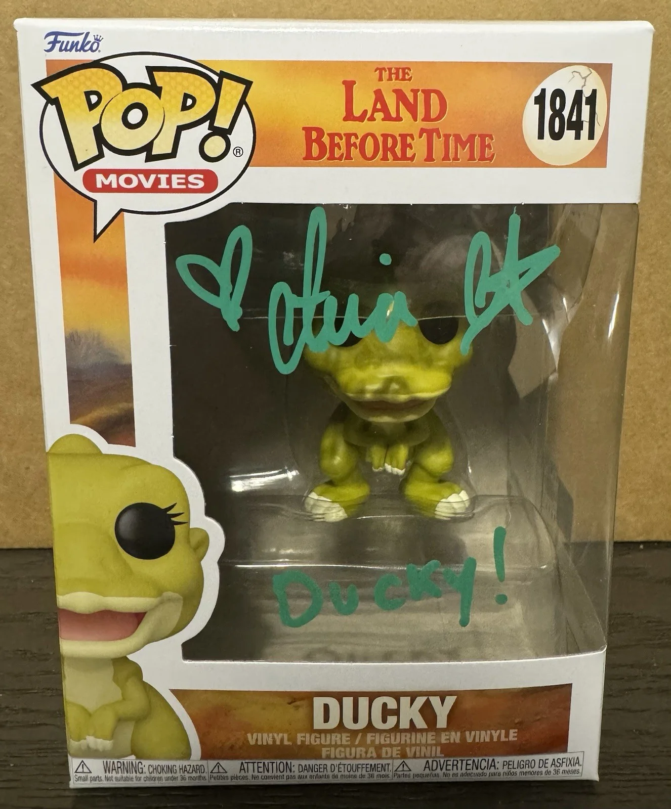 Aria Noelle Curzon — Signed Aria Noelle Curzon DUCKY Funko Pop Land Before Time OCCM Authentication