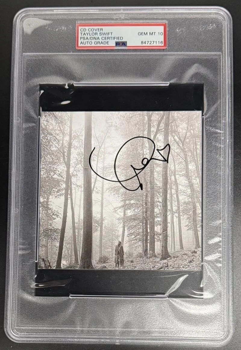 Taylor Swift — Taylor Swift Signed Autograph Folklore CD PSA/DNA Encapsulated Grade GEM MINT 10