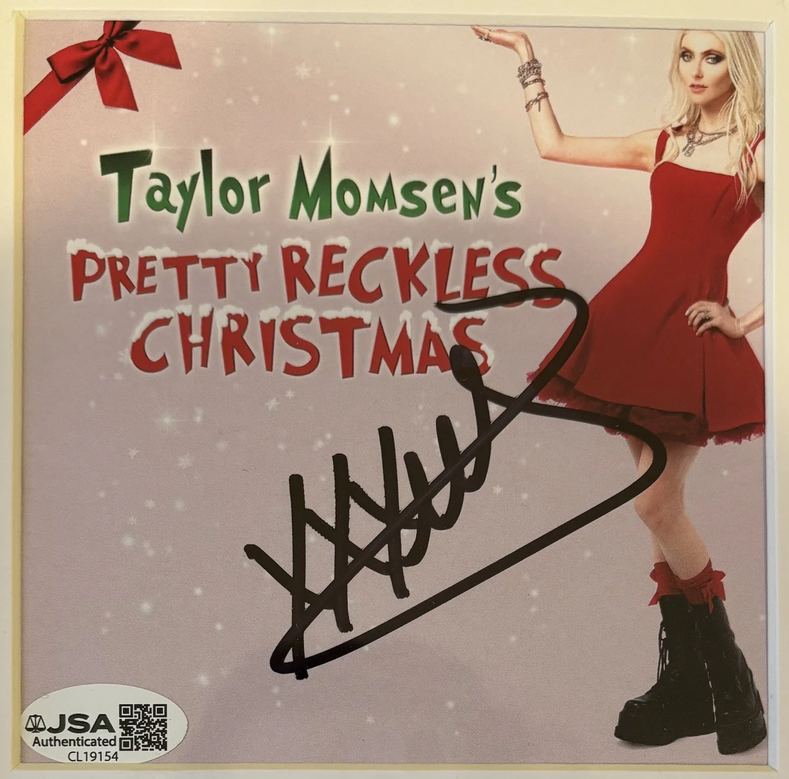 Taylor Momsen — Taylor Momsen Signed The Pretty Reckless Christmas CD Framed JSA COA, image 2