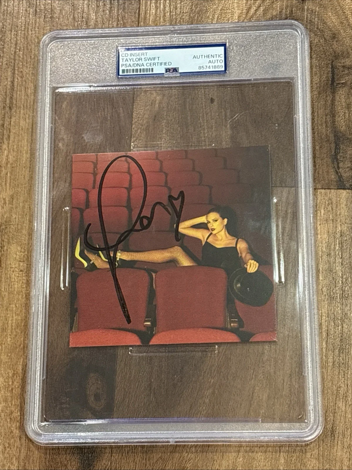 Taylor Swift — Taylor Swift Signed Heart The Life of a Showgirl CD Cover PSA Encased Authentic
