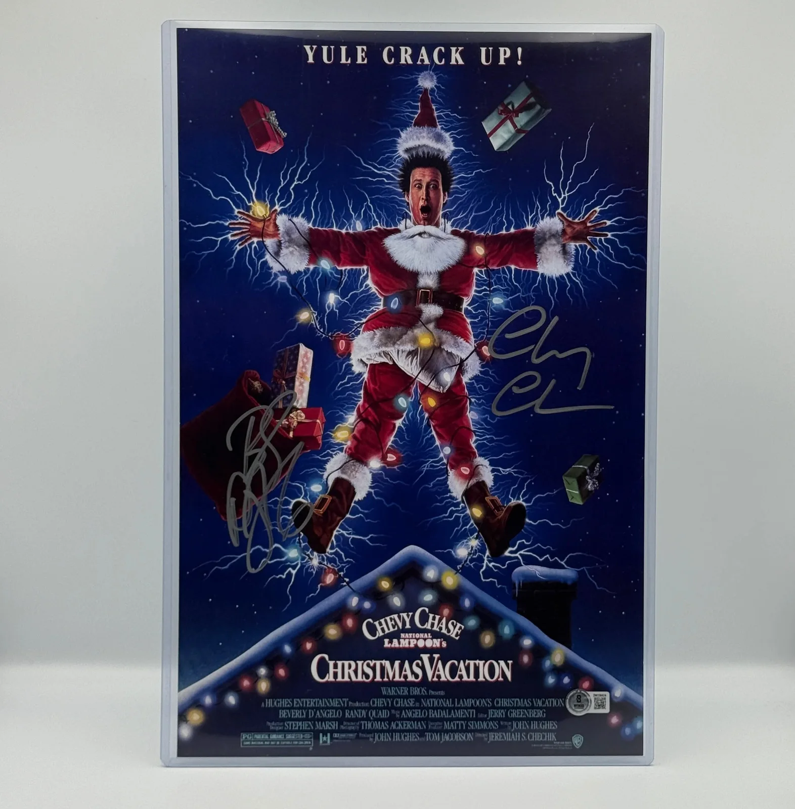 Chevy Chase, Beverly D'Angelo — Chevy Chase & Beverly D'Angelo Signed 11x17 Poster Christmas Vacation Beckett