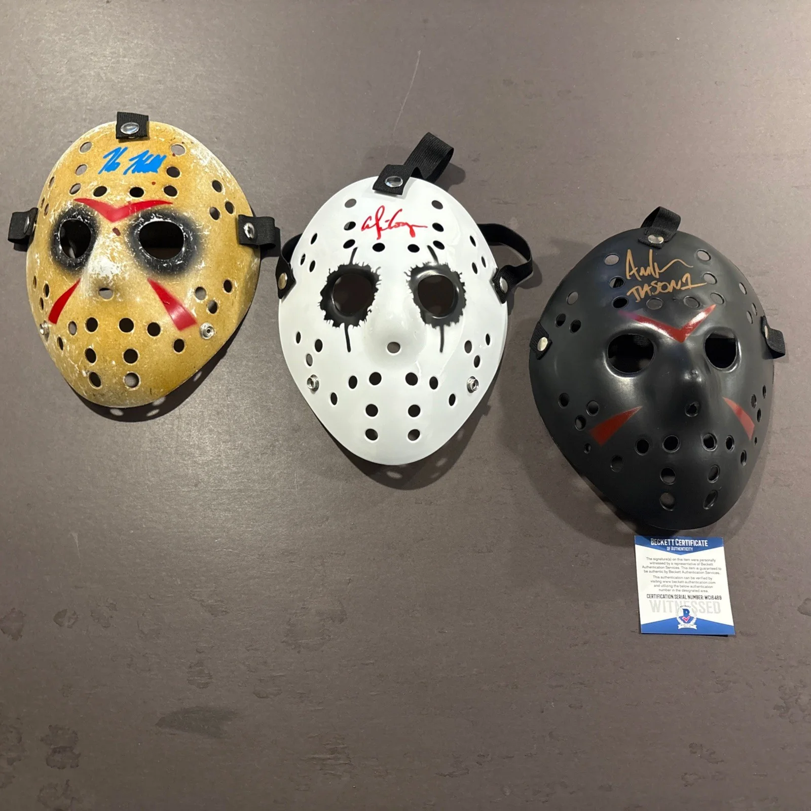 Kane Hodder & Alice Cooper and Ari Lehman — Kane Hodder-Alice Cooper-Ari Lehman Signed Replica Friday the 13th Masks-Beckett