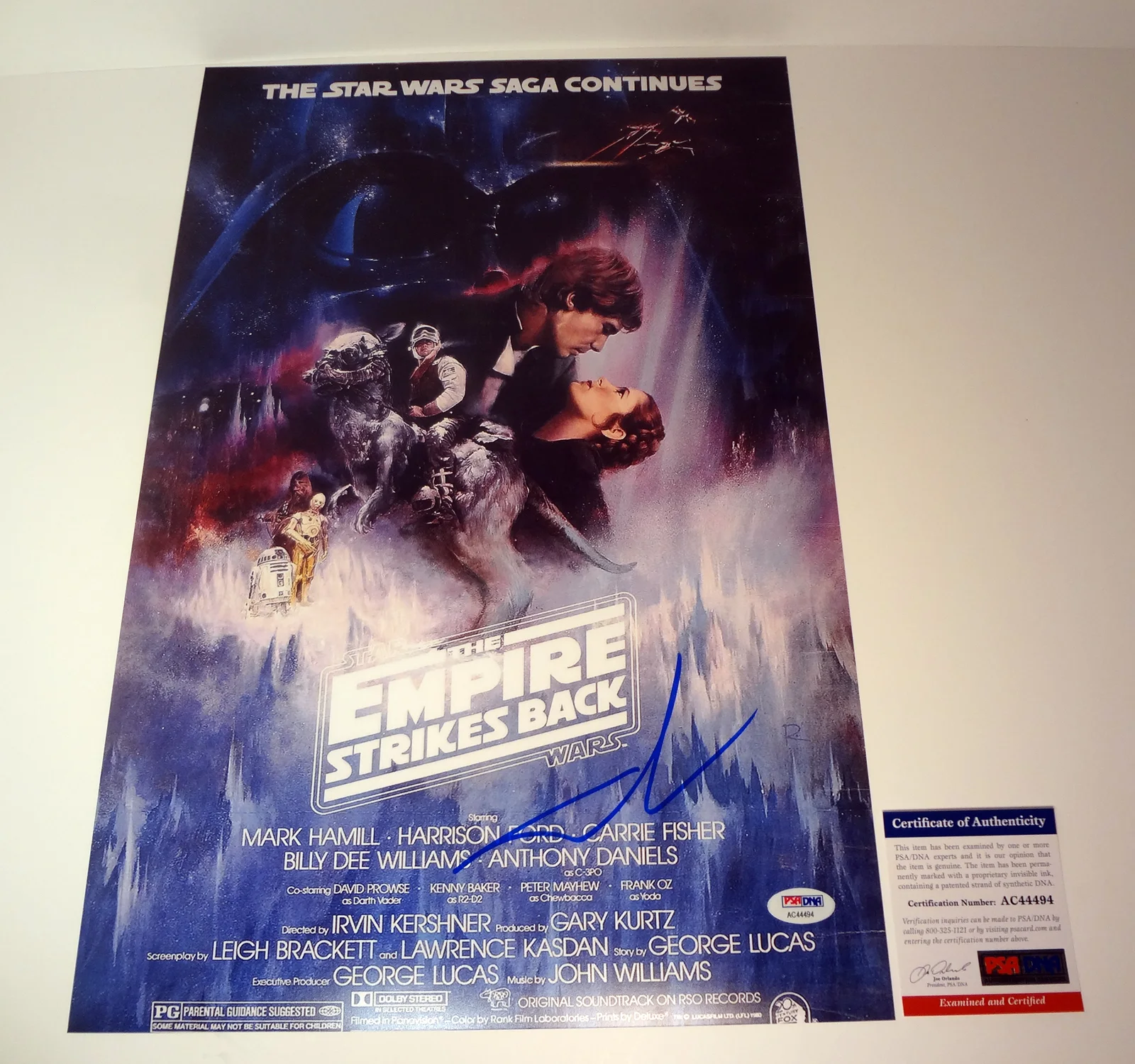 George Lucas — George Lucas Signed Star Wars The Empire Strikes Back Movie Poster PSA/DNA COA