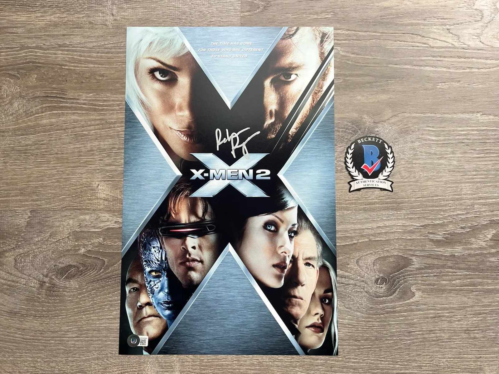 Rebecca Romijn — Rebecca Romijn Signed X2 11x17 Photo Beckett COA X-Men Mystique Autograph Marvel