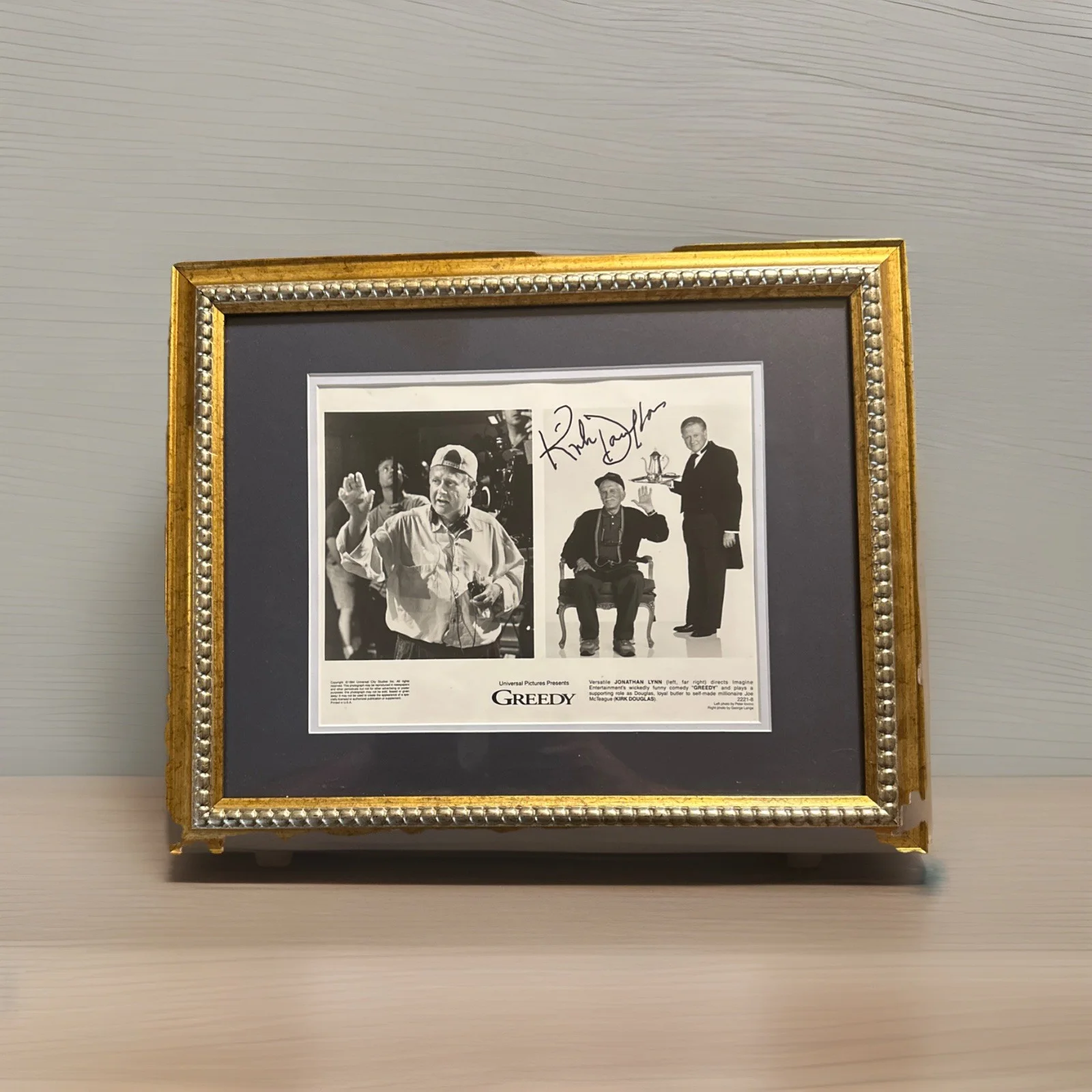 Kirk Douglas — kirk douglas signed autograph Picture From Movie Greedy In A 16”X 13” Frame