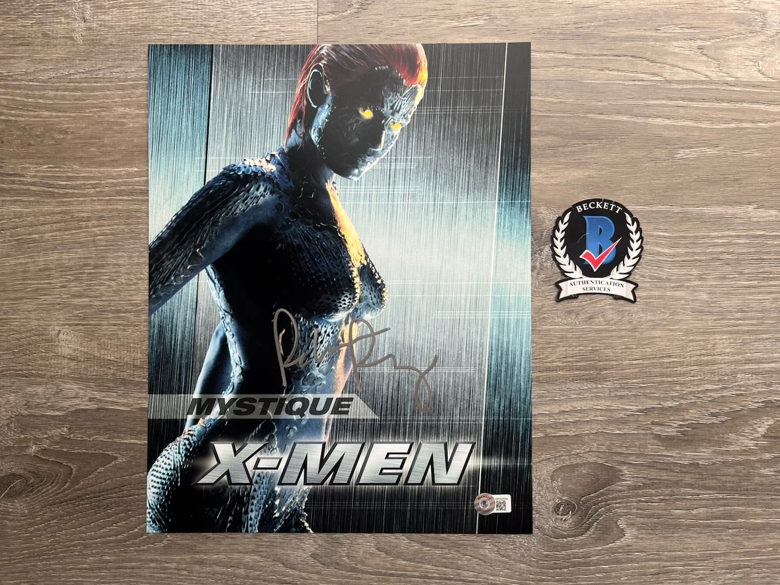 Rebecca Romijn — Rebecca Romijn Signed Mystique 11x14 Photo Beckett COA X-Men Autograph Marvel