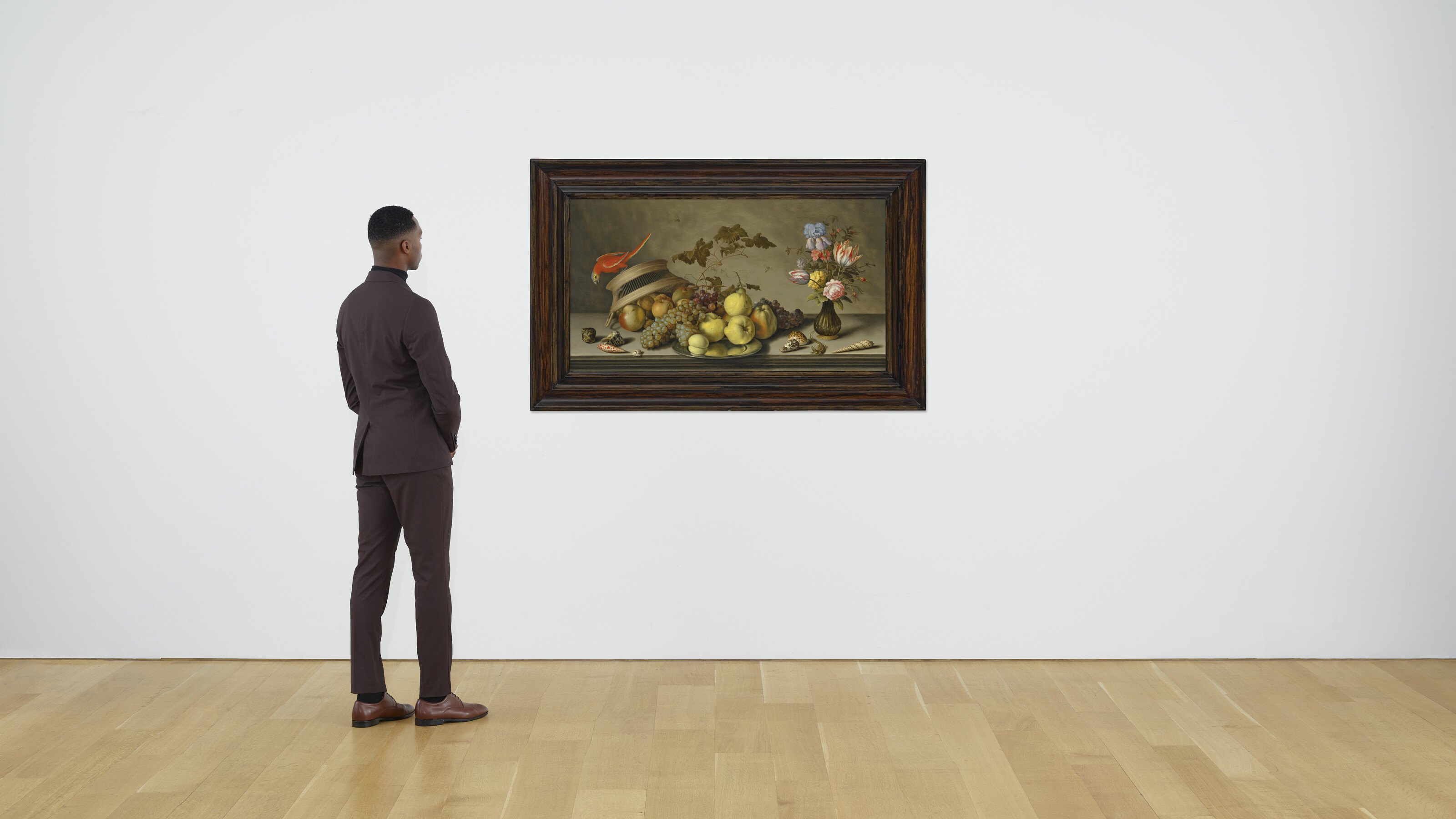 Balthasar Van Der Ast — Попугай в перевернутой корзине с фруктами, оловянной тарелкой, вазой с цветами, насекомыми, ящерицей и ракушками на каменном выступе, изображение 4