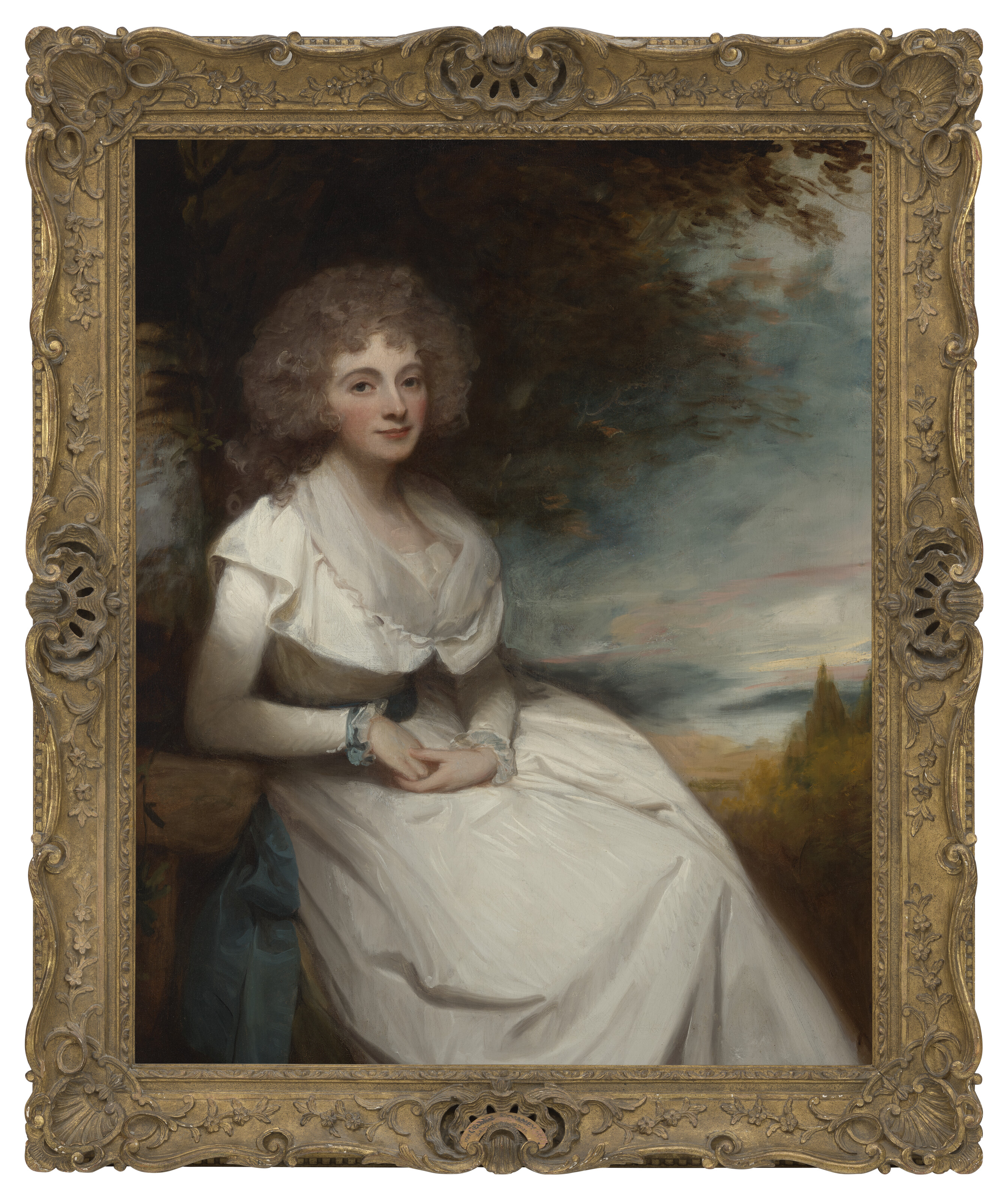 George Romney — Портрет Эстер, леди Лашингтон, урожденной Болдеро (1753-1830), в три четверти роста, в белом платье, сидящей на фоне пейзажа, изображение 2