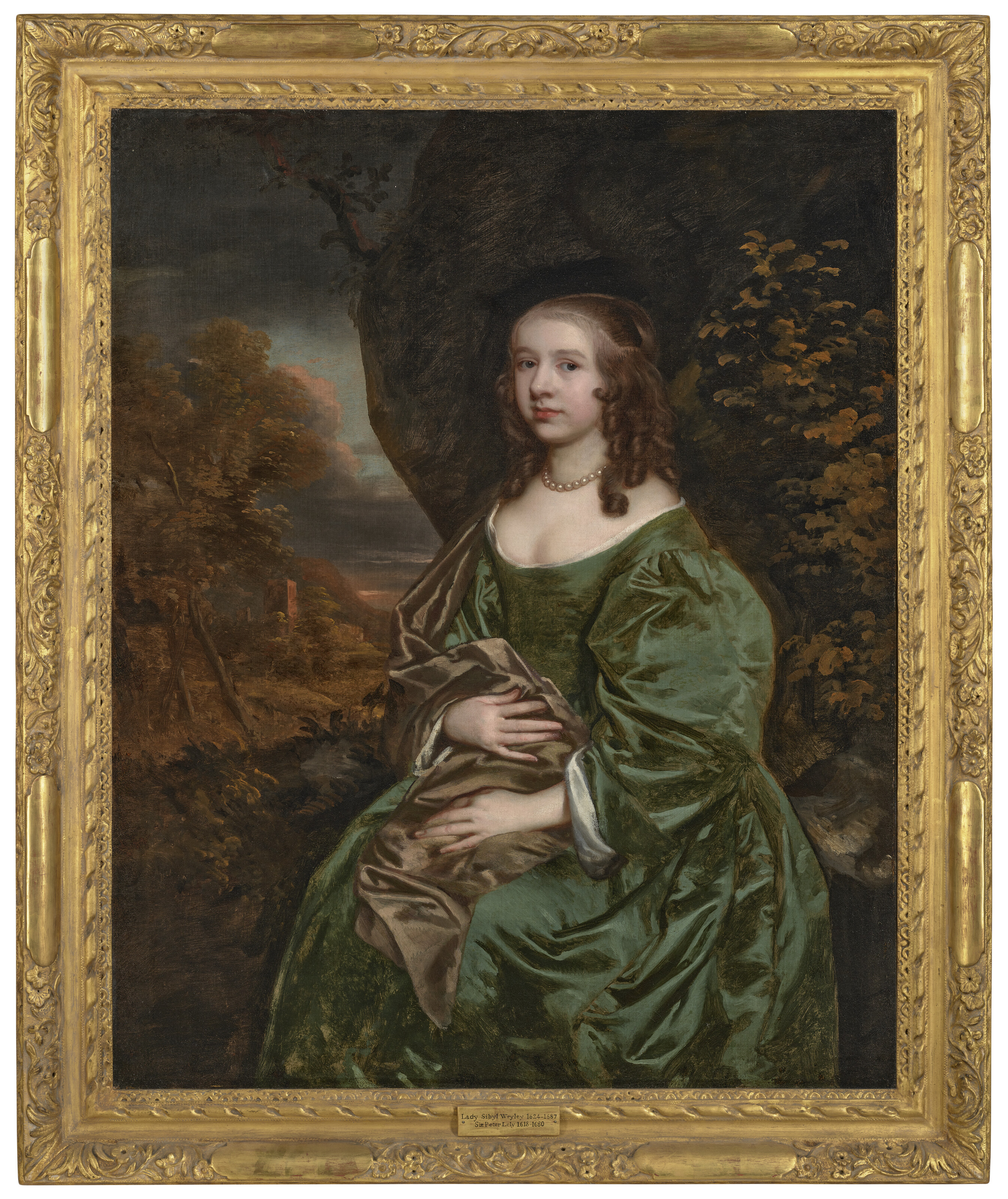 Peter Lely — Портрет леди Сибил Уайрли (1624-1687), урожденной Мастерс, в три четверти роста, сидящей в зеленом платье, на фоне лесистого пейзажа, изображение 2