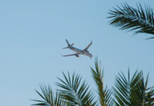 HurghadaEgypt20082019APlaneGoesOnBlueSkyThrough