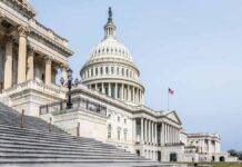 TheUnitedStatesCapitolBuildingInWashingtonDcStandsTall