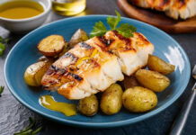 BacalhauАLagareiroGrilledCodServedWithRoastedPotatoesAnd